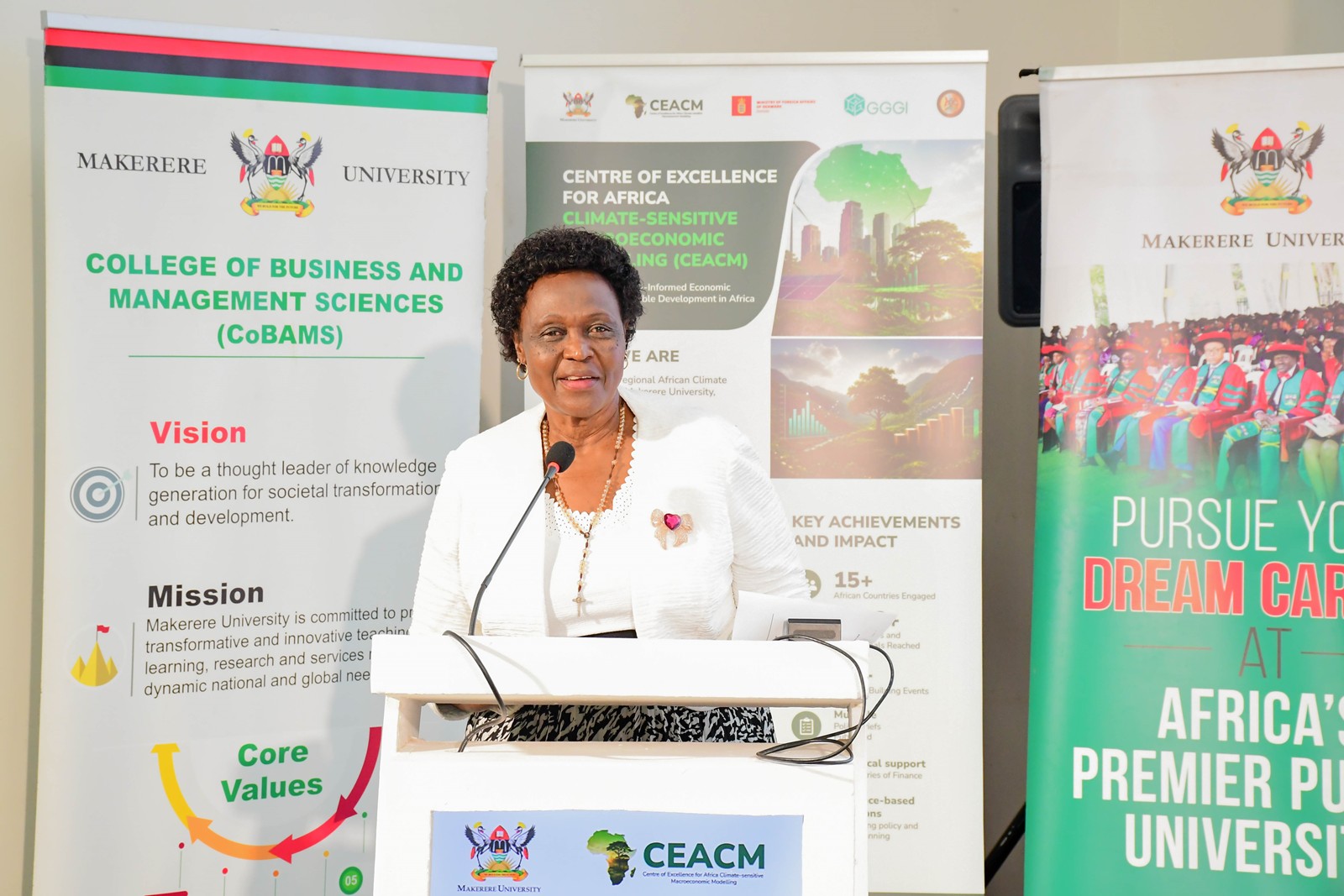 Hon. Beatrice Atim Anywar, Minister of State for Environment, addressing participants at the launch. Launch of Policy Briefs developed by the Centre of Excellence for Africa Climate-Sensitive Macroeconomic Modelling (CEACM), College of Business and Management Sciences (CoBAMS), 15th July 2026, Senior Common Room, Main Building, Makerere University, Kampala Uganda, East Africa.