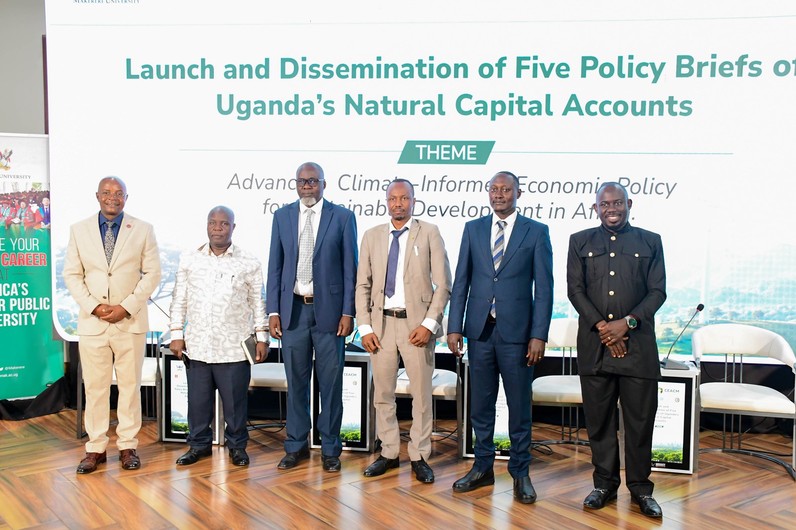 L-R: Prof. Edward Bbaale-Moderator, Dr. Ronald Kaggwa-National Planning Authority, Mr. Nathan Mununuzi-Ministry of Water and Environment, Mr. Wilson Asiimwe-Ministry of Finance Planning and Economic Development, Mr. Godwin Kamugisha-National Environment Management Authority, Dr. Peter Babyenda, Coordinator of CEACM. Launch of Policy Briefs developed by the Centre of Excellence for Africa Climate-Sensitive Macroeconomic Modelling (CEACM), College of Business and Management Sciences (CoBAMS), 15th July 2026, Senior Common Room, Main Building, Makerere University, Kampala Uganda, East Africa.