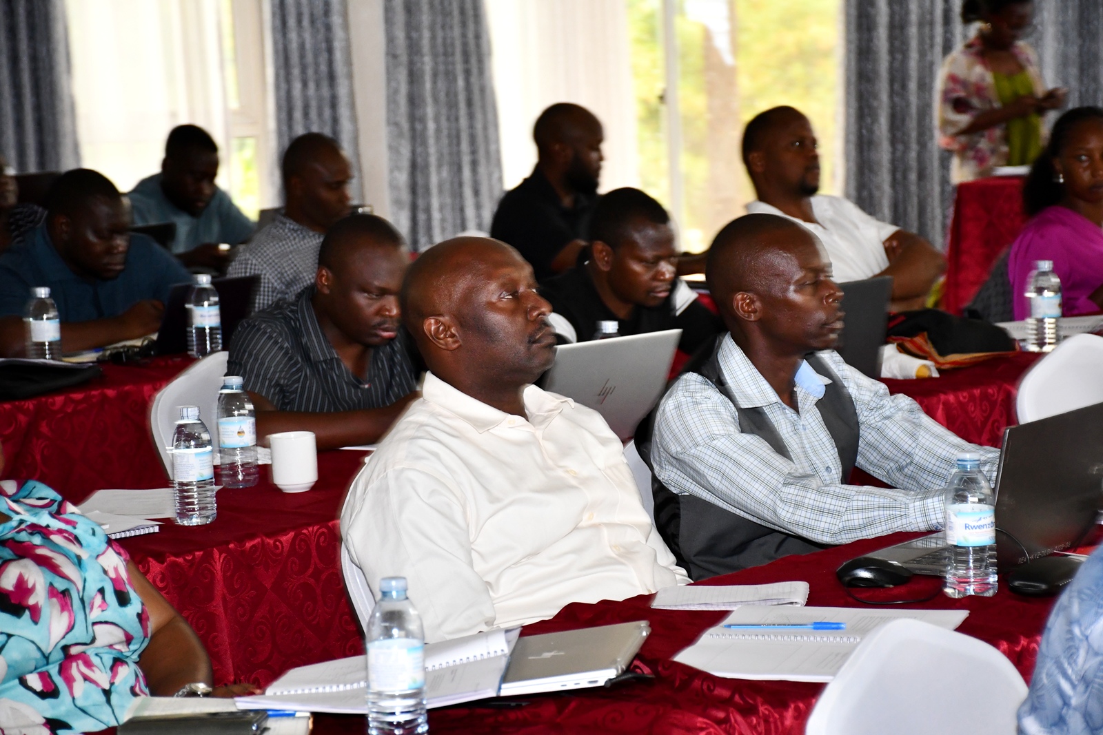 A section of participants during the graduation ceremony. Public Investment Management Centre of Excellence (PIM CoE), Makerere University, Kampala in partnership with the Ministry of Finance, Planning and Economic Development (MoFPED) graduation of two-week training of the fourth cohort of the Capacity Enhancement and Hands-on Training on the Guidelines for Financial Clearance and the Certificate of Financial Implications (CFI) – Integrated Regulatory Cost-Benefit Analysis. 3rd July 2026, Pearl on the Nile Hotel, Jinja, Uganda, East Africa.