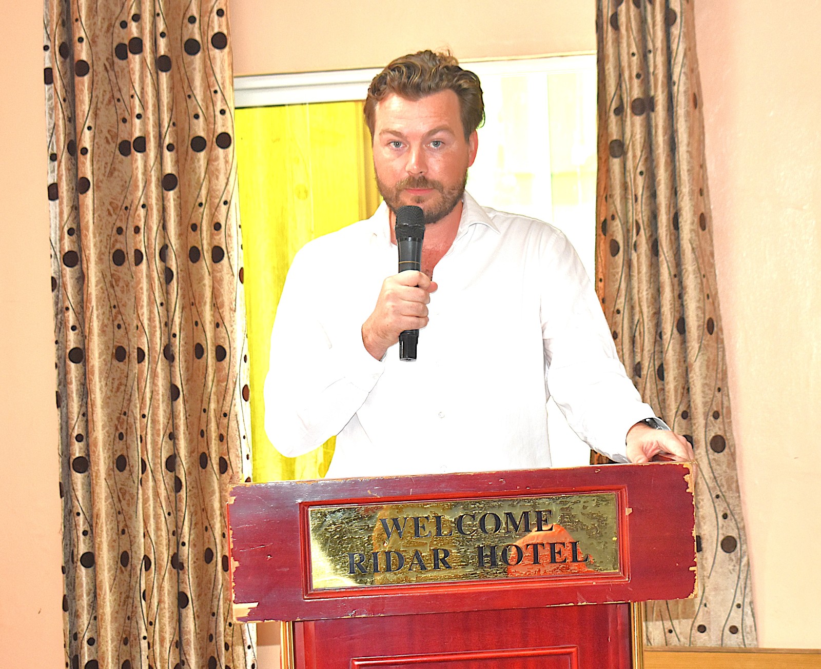Mr. David Bargh, Team Leader of COFAD addressing participants at the training workshop. College of Natural Sciences (CoNAS), Makerere University, capacity-building training for academic and technical staff to deepen their understanding of CBET principles and equip them with the skills required to design, deliver, and assess competency-based curricula, conducted with support from the Strengthening Commercial Aquaculture (SCA) Programme, funded by the Embassy of the Kingdom of the Netherlands in Kampala (EKN) and implemented by the COFAD Consortium (COFAD–ThinkAqua–WUR), 21-23 July 2026, Ridar Hotel, Seeta, Mukono, Uganda, East Africa.