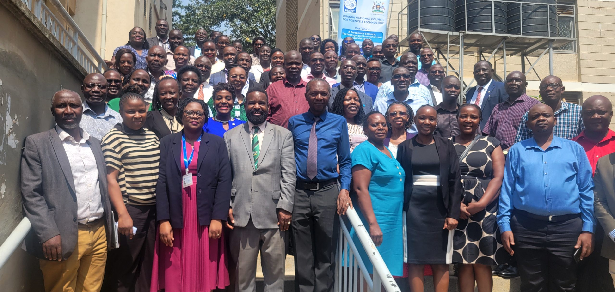 Participants pose for a group photo on Day One of the Good Research Regulatory Practice (GRRP) Course for members of Research Ethics Committees (RECs). Day one of the three-day Good Research Regulatory Practice (GRRP) Course for members of Research Ethics Committees (RECs) from Makerere University and other institutions organized by the Directorate of Research, Innovations and Partnerships (DRIP) at Makerere University in partnership with the Uganda National Council for Science and Technology (UNCST), 22nd July 2026, Senate Building, Kampala Uganda, East Africa.