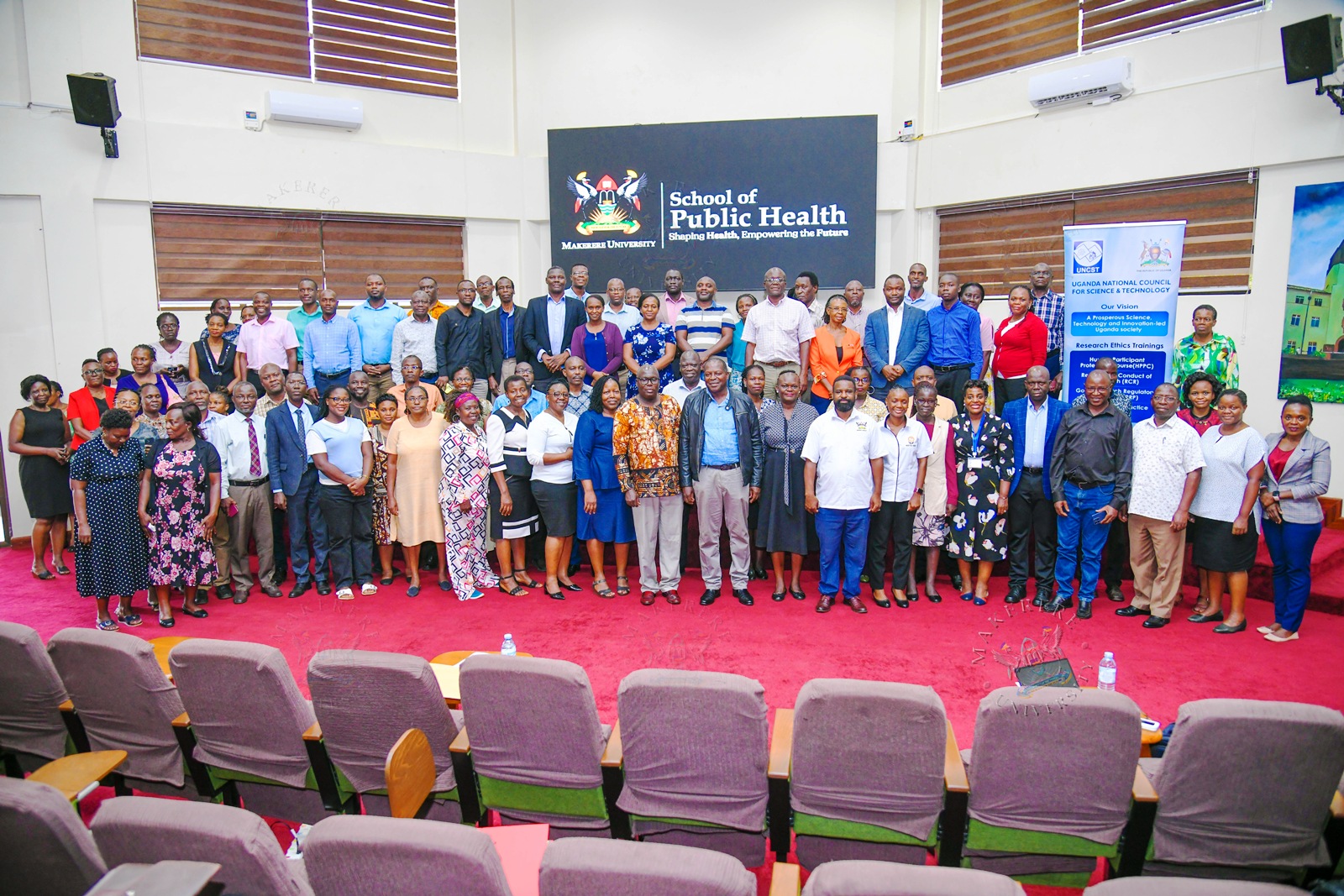 Prof. Tonny Oyana and Prof. Robert Wamala with participants at the close of the GRRP Training on 24th July 2026. Closing Ceremony of the three-day Good Research Regulatory Practice (GRRP) Course for members of Research Ethics Committees (RECs) from Makerere University and other institutions organized by the Directorate of Research, Innovations and Partnerships (DRIP) at Makerere University in partnership with the Uganda National Council for Science and Technology (UNCST), 24th July 2026, MakSPH Auditorium, Kampala Uganda, East Africa.