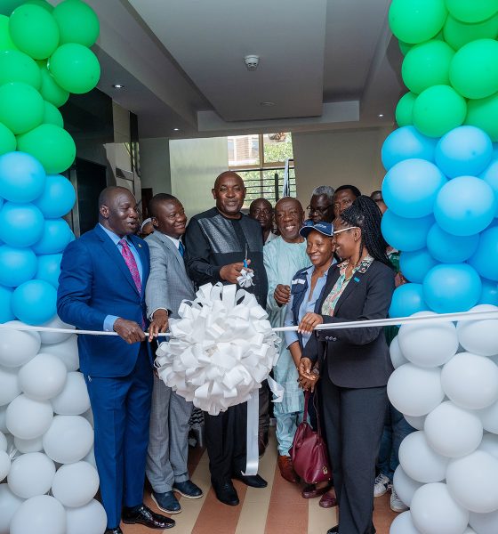 Dr Chris Baryomunsi, flanked by Dr Tolbert Nyenswah, Dr Marie-Roseline Belizaire and Dr Andrew Kambugu, cuts the ribbon marking the launch of the Continental Incident Management Support Team at IDI's McKinnell Knowledge Centre, Makerere University. Formal launch of Continental Incident Management Support Team (IMST), a joint Africa Centres for Disease Control and Prevention (Africa CDC) and World Health Organization (WHO) operation racing to contain the Bundibugyo strain of Ebola sweeping through the Democratic Republic of the Congo, 26th June 2026, Infectious Diseases Institute (IDI) McKinnell Knowledge Centre, Makerere University, Kampala Uganda, East Africa.