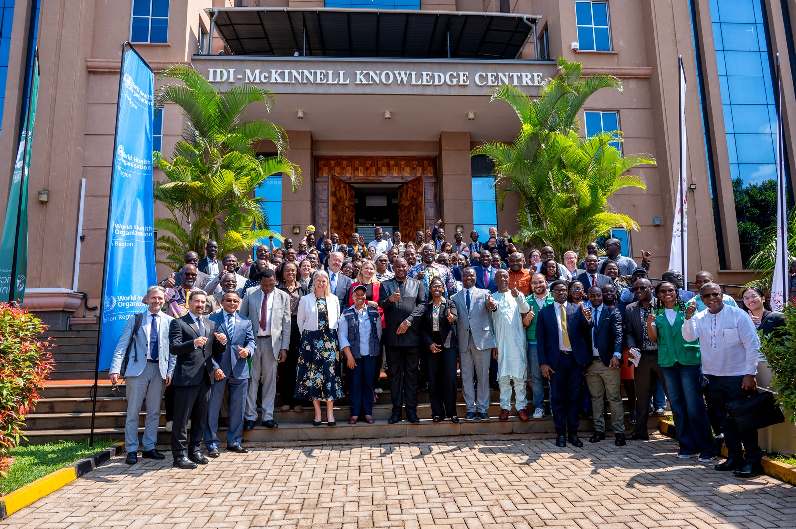Dr Chris Baryomunsi joins delegates for a group photograph at the IMST launch, Infectious Diseases Institute, Makerere University. Formal launch of Continental Incident Management Support Team (IMST), a joint Africa Centres for Disease Control and Prevention (Africa CDC) and World Health Organization (WHO) operation racing to contain the Bundibugyo strain of Ebola sweeping through the Democratic Republic of the Congo, 26th June 2026, Infectious Diseases Institute (IDI) McKinnell Knowledge Centre, Makerere University, Kampala Uganda, East Africa.