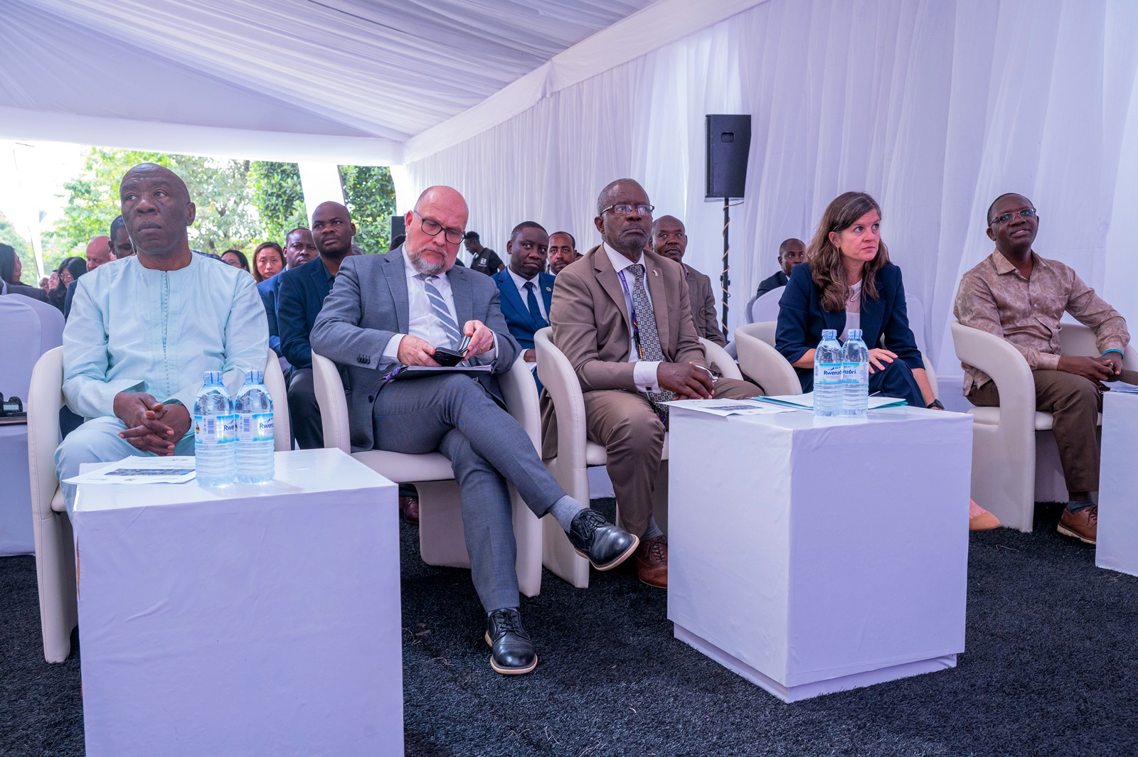 Prof Henry Mwanaki Alinaitwe, Deputy Vice Chancellor for Finance and Administration at Makerere University, with the acting US Ambassador to Uganda and Prof Samuel Luboga, IDI board chair, at the IMST launch. Formal launch of Continental Incident Management Support Team (IMST), a joint Africa Centres for Disease Control and Prevention (Africa CDC) and World Health Organization (WHO) operation racing to contain the Bundibugyo strain of Ebola sweeping through the Democratic Republic of the Congo, 26th June 2026, Infectious Diseases Institute (IDI) McKinnell Knowledge Centre, Makerere University, Kampala Uganda, East Africa.