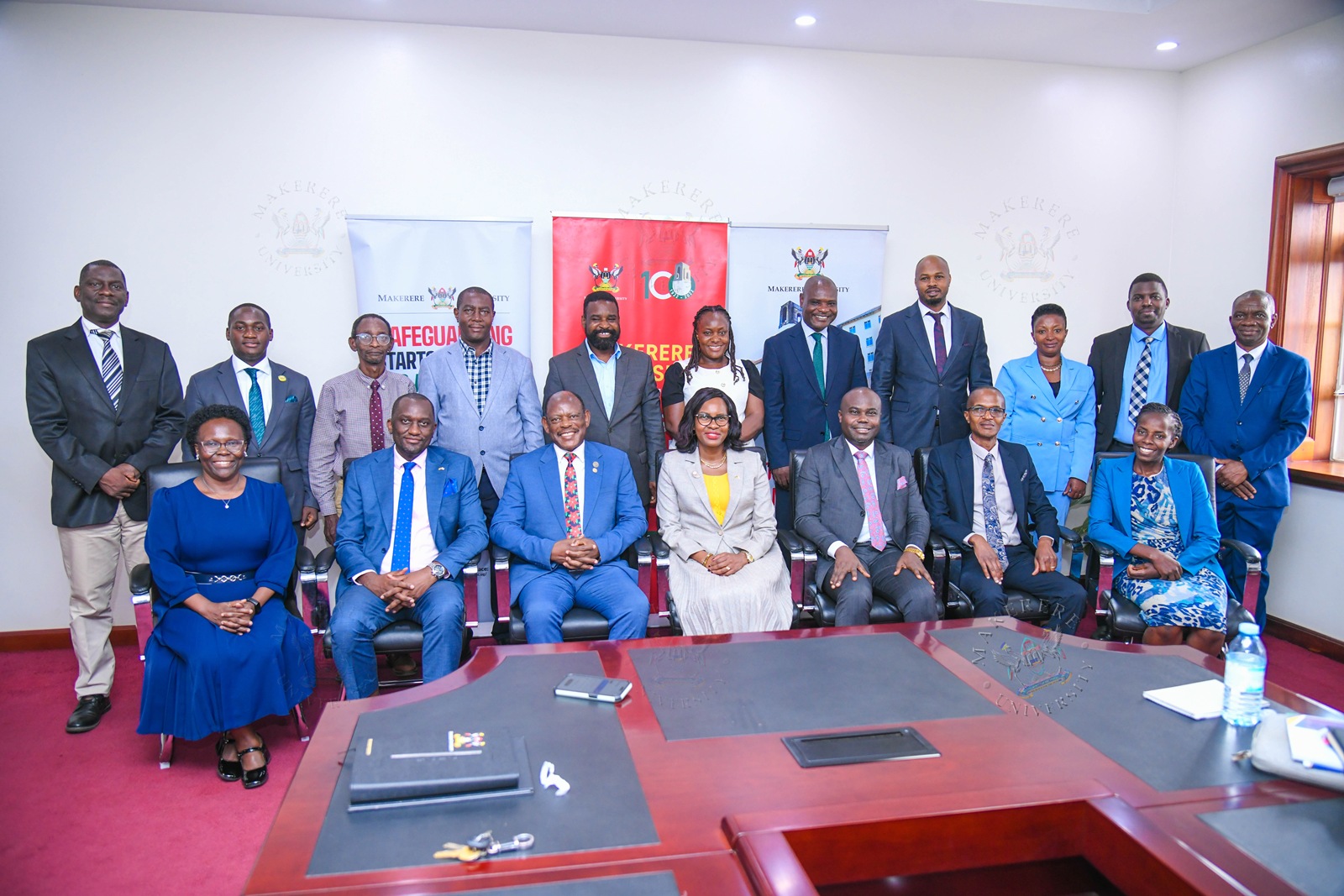 Seated L-R: Prof. Sylvia Nannyonga-Tamusuza, Mr. Simon Kizito, Prof. Barnabas Nawangwe, Prof. Pauline Byakika-Kibwika, Prof. Joseph Ngonzi, Prof. Robert Bitariho, and Ms. Robinah Nakakeeto with Makerere Management and the rest of the MUST delegation (Standing) on 23rd July 2026. Vice Chancellor, Prof. Barnabas Nawangwe and Members of Management host delegation from Mbarara University of Science and Technology (MUST) led by the Vice Chancellor Prof. Pauline Byakika-Kibwika to benchmark the Grants Management System, 23rd July 2026, Makerere University, Kampala Uganda, East Africa.