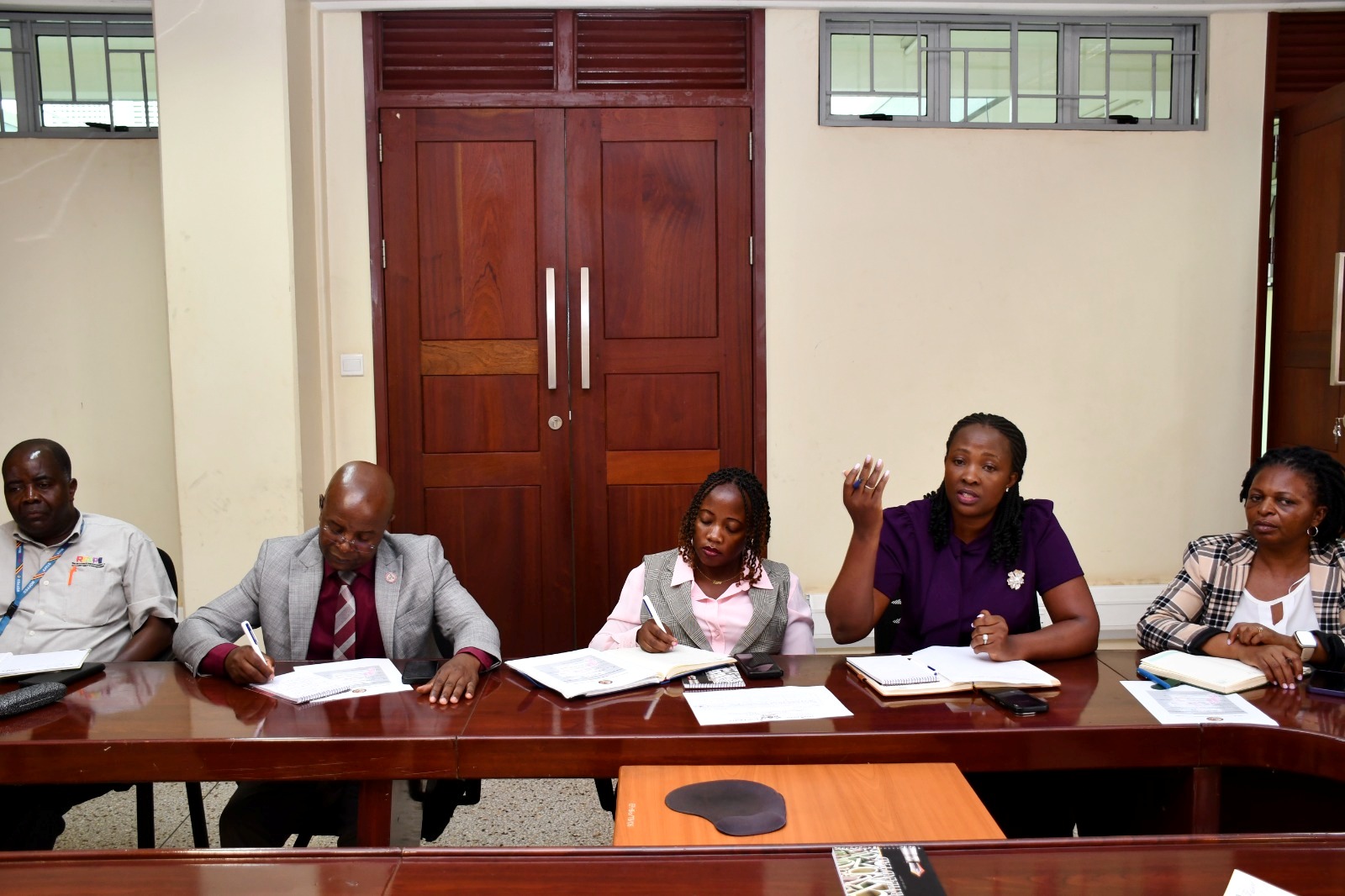 Ms. Esther Ayebare (2nd R) addresses the meeting. Ms. Esther Ayebare. Public Investment Management Centre of Excellence (PIM CoE) at Makerere University hosts PIM-Plus Project delegation from Ministry of Finance, Planning and Economic Development (MoFPED) who assessed readiness to receive approximately USD 8 million to support the construction of a modern teaching and residential facility, 9th July 2026, Yusuf Lule Central Teaching Facility, Kampala Uganda, East Africa.