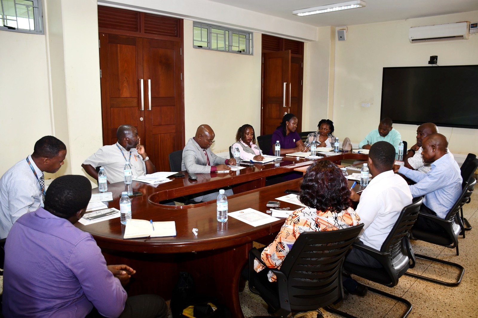 The meeting in session. Public Investment Management Centre of Excellence (PIM CoE) at Makerere University hosts PIM-Plus Project delegation from Ministry of Finance, Planning and Economic Development (MoFPED) who assessed readiness to receive approximately USD 8 million to support the construction of a modern teaching and residential facility, 9th July 2026, Yusuf Lule Central Teaching Facility, Kampala Uganda, East Africa.