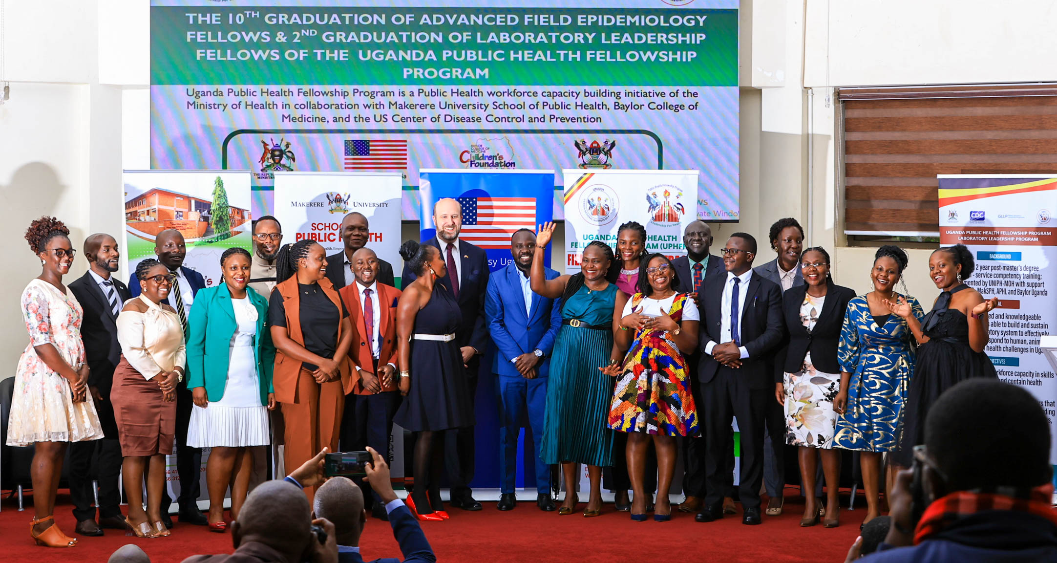 Graduates pose with then U.S. Ambassador to Uganda H.E. William W. Popp during the 10th graduation of Advanced Field Epidemiology Fellows and the 2nd graduation of Laboratory Leadership Fellows under the Uganda Public Health Fellowship Programme in January 2026. Makerere University School of Public Health (MakSPH) reflection on long and productive partnership with the people and Government of the United States, spanning more than 35 years. Kampala Uganda, East Africa.