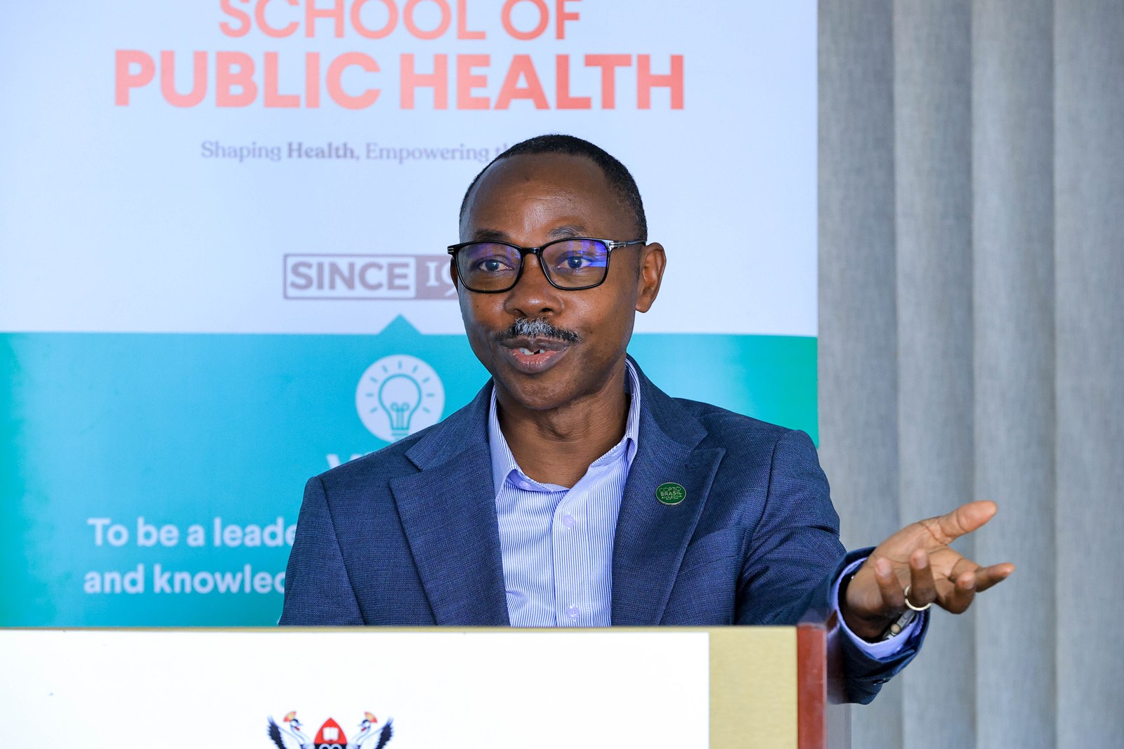Dr. Didacus Namanya, speaking on behalf of the Ministry of Health, delivers remarks during the study launch on 11 June 2026, urging the research team to ensure evidence on lead exposure informs policy, practice and practical community protection measures. Makerere University School of Public Health (MakSPH) launch of year-long study, titled “Assessment of Lead Contamination in Domestic Cookware, Supply Chains, and Exposure Pathways in Informal Settlements of Kampala,” 11th June 2026, ResilientAfrica Network (RAN), Kololo MakSPH Annex, Kampala Uganda, East Africa.