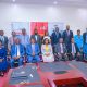 Makerere Vice Chancellor Prof. Barnabas Nawangwe (right) with MUST Vice Chancellor Prof. Pauline Byakika-Kibwika (left) with the members during a benchmarking visit.
