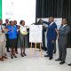 Hon. Henry Musasizi (3rd R) unveils the Makerere University Strategic Plan (2025-2030).