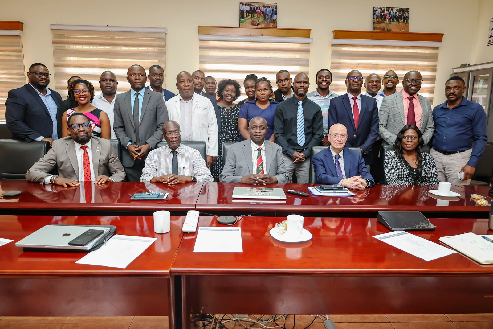 Officials pose for a group photo with Dr. Steven Schiff during his visit to CHS on 5th August 2026. Makerere University College of Health Sciences (MakCHS) hosts Director of the NIH Fogarty International Center (FIC), Dr. Steven Schiff, 5th August 2026, Mulago Hospital Complex, Kampala Uganda, East Africa.