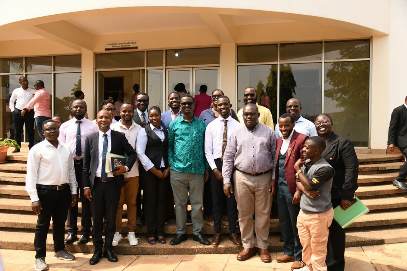 Dr. Jimmy Spire Ssentongo enjoys a photo moment with some members of Cohort 1. Award ceremony for the pioneer cohort of the Certificate in Critical Thinking and Social Intelligence, a short course offered by the Department of Philosophy in the School of Liberal and Performing Arts, College of Humanities and Social Sciences (CHUSS) with support from Konrad Adenauer Stiftung and UNESCO. 7th August 2026, Conference Hall, School of Food Technology, Nutrition and Bioengineering, CAES, Makerere University, Kampala Uganda.