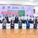 Seated L-R: Prof. Sarah Ssali, Mr. Sergey Lobanov-Head of Mission, Russian Embassy in Uganda, Prof. Nikolay D. Dmitriev, Prof. Edward Bbaale, Dr. Robert Ngobi, Mr. Davis Vuningoma and Prof. Ibrahim Mike Okumu with Dr. Peter Babyenda and CoBAMS Students (Standing) on 20th August 2026. College of Business and Management Sciences (CoBAMS) supported by the Makerere University Research and Innovations Fund (Mak-RIF) in collaboration with the Witte Institute for New Industrial Development and St. Petersburg Polytechnic University, Russia Conference on The Theory of Noonomy and its Role in Resolving Modernity Issues: Pathways to Sustainable Social and Economic Transformation, 20th Aug 2026, Senior Common Room, Main Building, Makerere University, Kampala Uganda, East Africa