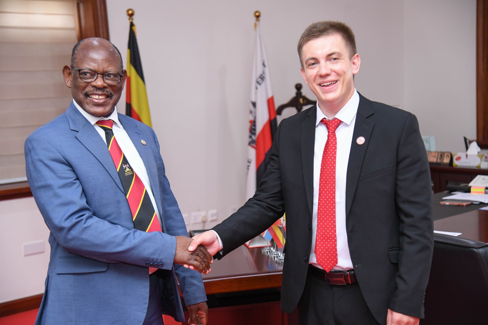 Prof. Barnabas Nawangwe shakes hands with Prof. Nikolay D. Dmitriev. College of Business and Management Sciences (CoBAMS) supported by the Makerere University Research and Innovations Fund (Mak-RIF) in collaboration with the Witte Institute for New Industrial Development and St. Petersburg Polytechnic University, Russia Conference on The Theory of Noonomy and its Role in Resolving Modernity Issues: Pathways to Sustainable Social and Economic Transformation, 20th Aug 2026, Senior Common Room, Main Building, Makerere University, Kampala Uganda, East Africa