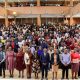 Prof. Sarah Ssali and Prof. Edward Bbaale pose for a group photo with officials and first-year students on 4th August 2026. College of Business and Management Sciences (CoBAMS) kick off of four-day orientation programme 4th August 2026, Yusuf Lule Central Teaching Facility Auditorium, Makerere University, Kampala Uganda, East Africa.