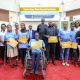 A cross-section of Cohort 9 Scholars pose in a photo with officials shortly after getting their award letters. Award Ceremony for Cohort 9 of 258 recipients of the prestigious Mastercard Foundation scholarship for the 2026/2027 academic, 20th August 2026, Makerere University School of Public Health (MakSPH) Auditorium, Main Campus, Kampala Uganda, East Africa.
