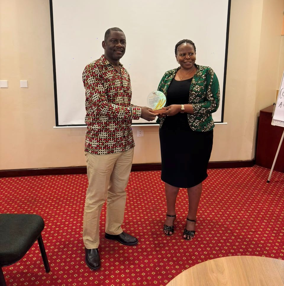 Prof. Julius Kikooma (L) with Ms. Prossy Nakayiiki ( Deputy AR). Directorate of Graduate Training (DGT) Makerere University three-day strategic planning retreat, July 29–31, 2026, Royal Suites Hotel, Bugolobi, Kampala Uganda, East Africa.
