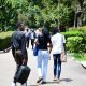 Female and male students along the Main Building Walkway on a bright sunny day, 6th May 2026. Makerere University, Kampala Uganda, East Africa.