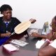 Ms. Rebecca Talikaza with some of her products during the interview. How to Manage a Side Hustle: The Story of Rebecca Talikaza of Beckiz Bathing Sponge and Custodian, Makerere University, Kampala Uganda, East Africa.