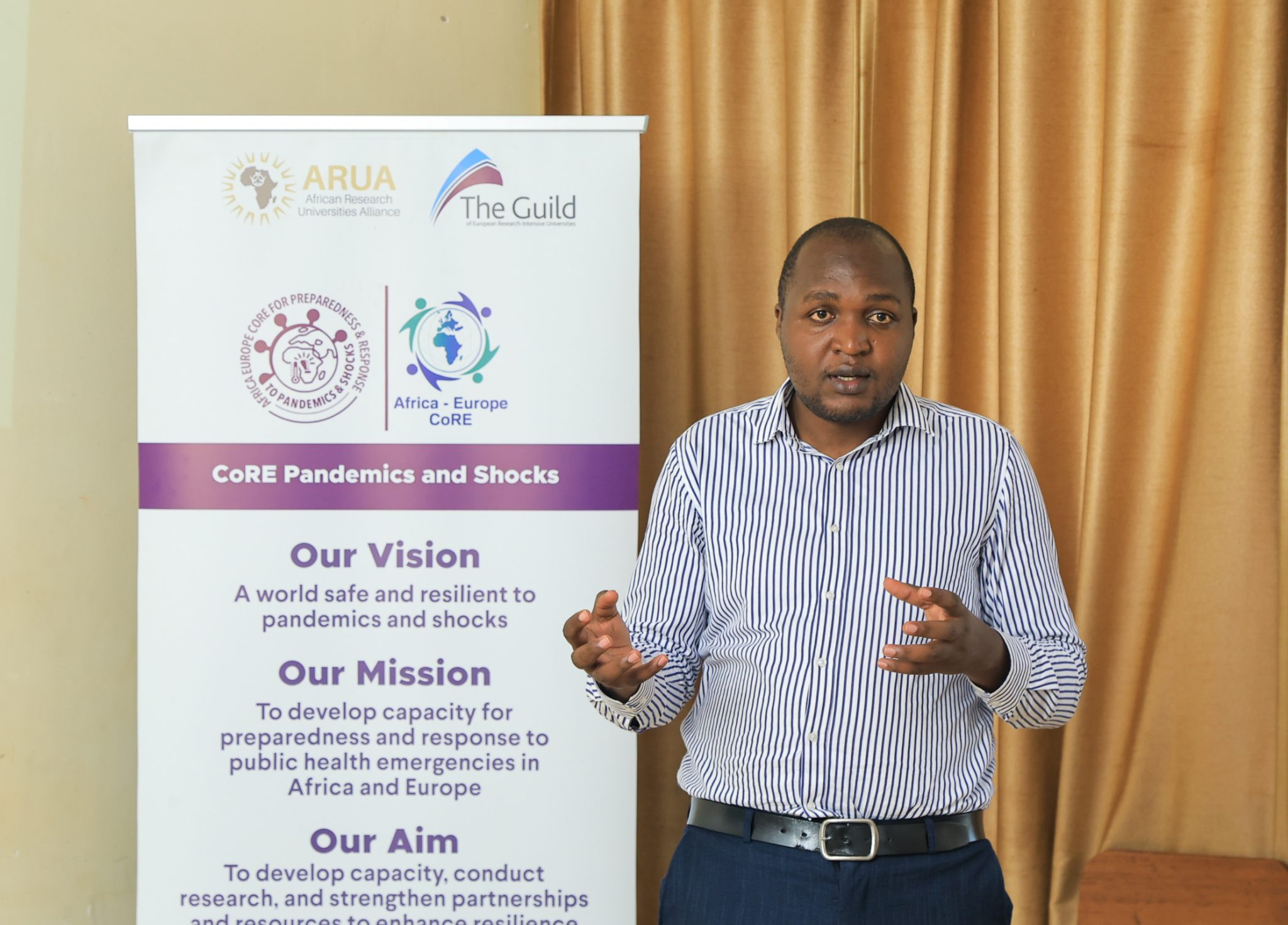 Mr. Douglas Bulafu engages participants during the Mpox response study dissemination meeting in Amuru District on 10 August 2026. Makerere University School of Public Health (MakSPH), through the Africa-Europe Cluster of Research Excellence (CoRE) for Preparedness and Response to Pandemics and Shocks, research dissemination of Uganda’s Mpox response with stakeholders in Kasese, Amuru, Nakasongola and Mayuge Districts Uganda, East Africa, 10th-14th August 2026.