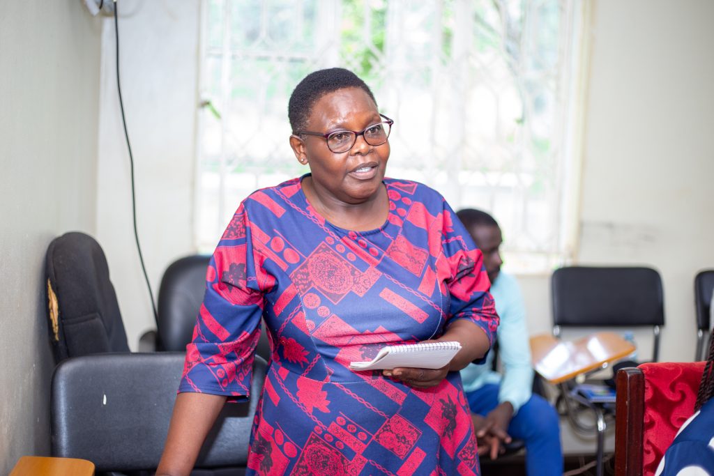 Ms. Eunice Vivian Asingo, Senior Nursing Officer at Nakasongola Health Centre IV, contributes to the discussion during the Mpox response study dissemination meeting in Nakasongola District on 12 August 2026. Makerere University School of Public Health (MakSPH), through the Africa-Europe Cluster of Research Excellence (CoRE) for Preparedness and Response to Pandemics and Shocks, research dissemination of Uganda’s Mpox response with stakeholders in Kasese, Amuru, Nakasongola and Mayuge Districts Uganda, East Africa, 10th-14th August 2026.