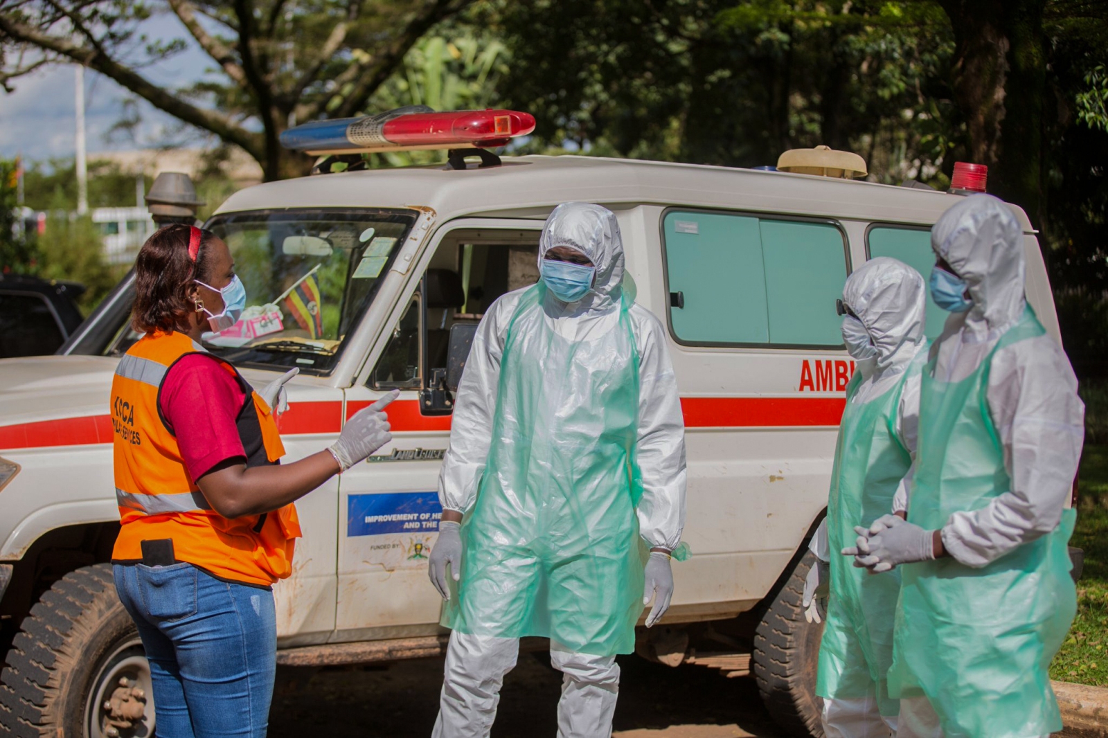 A KCCA Medical Office debriefs the MakSPH Field Epidemiologists and Surveillance Team during the CoVID-19 pandemic. Makerere University School of Public Health, Kampala, Uganda, East Africa.