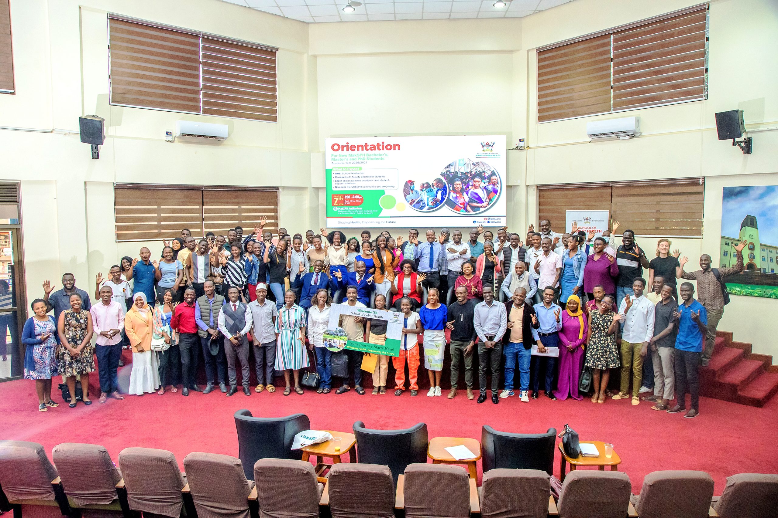 Newly-admitted students pose with MakSPH Dean Prof. Rhoda Wanyenze during orientation for the 2026/2027 academic year at the MakSPH Auditorium. Orientation for newly admitted students-75 students in the Bachelor of Environmental Health Science, 277 across the nine master’s programmes, and 21 across the two doctoral programmes, PhD by Research and PhD by Coursework and Research for the 2026/2027 academic, 7th August 2026, Makerere University School of Public Health (MakSPH) Auditorium, Main Campus, Kampala Uganda, East Africa.