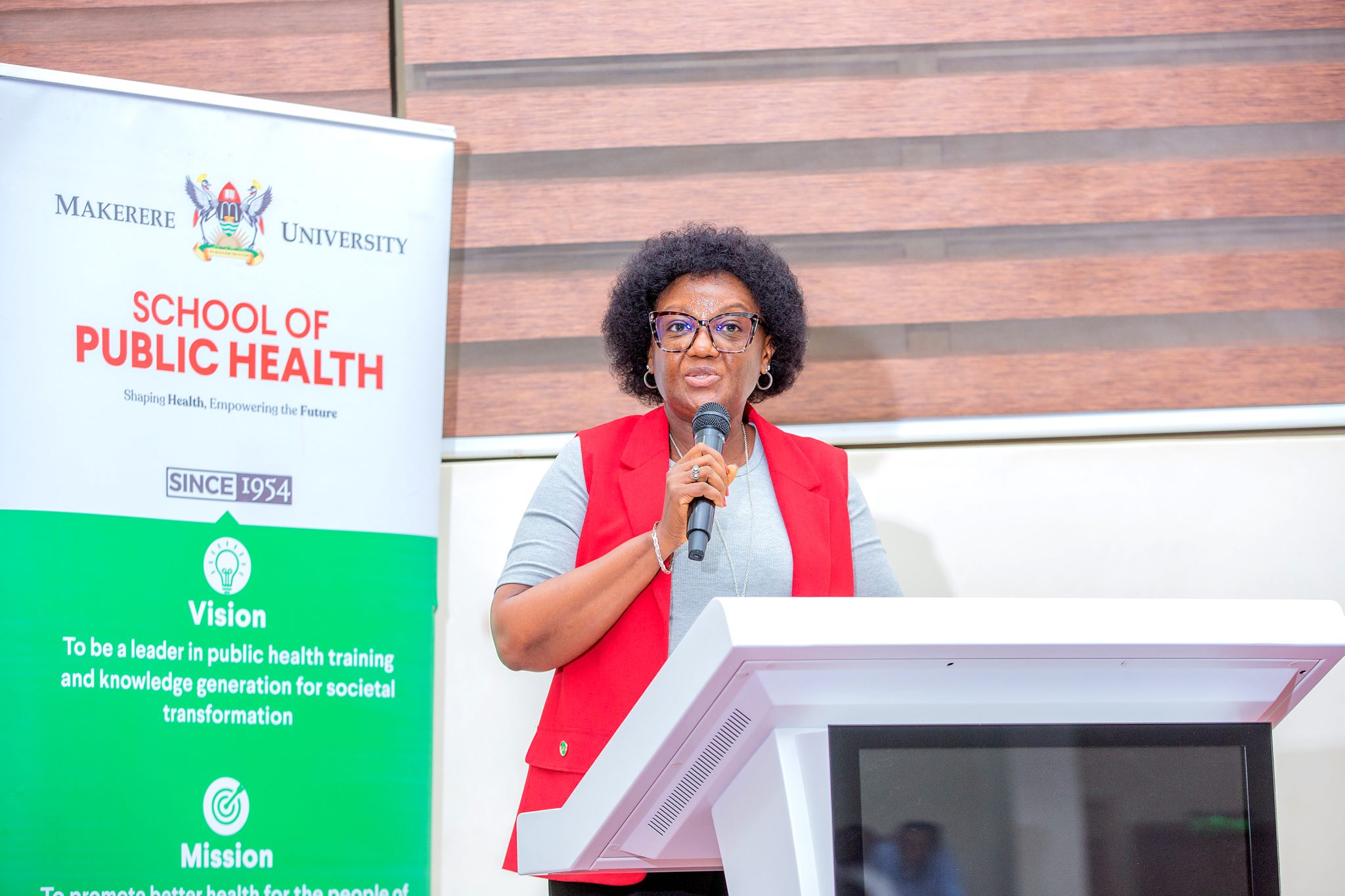 MakSPH Dean Prof. Rhoda Wanyenze addresses new students at orientation for the 2026/2027 academic year, 7 August 2026, MakSPH Auditorium, urging them to value capability over paper. Orientation for newly admitted students-75 students in the Bachelor of Environmental Health Science, 277 across the nine master’s programmes, and 21 across the two doctoral programmes, PhD by Research and PhD by Coursework and Research for the 2026/2027 academic, 7th August 2026, Makerere University School of Public Health (MakSPH) Auditorium, Main Campus, Kampala Uganda, East Africa.
