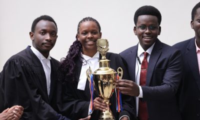 L-R: SoL team, Rodrick Kakwezi, Olga Asianut Blessing with colleague holding the trophy. Inaugural Digital Health Inter-University Moot Court Competition Held in partnership with the University of Warwick and supported by the Wellcome Trust, 12–13 August 2026, School of Law (SoL), Makerere University, Kampala Uganda, East Africa.