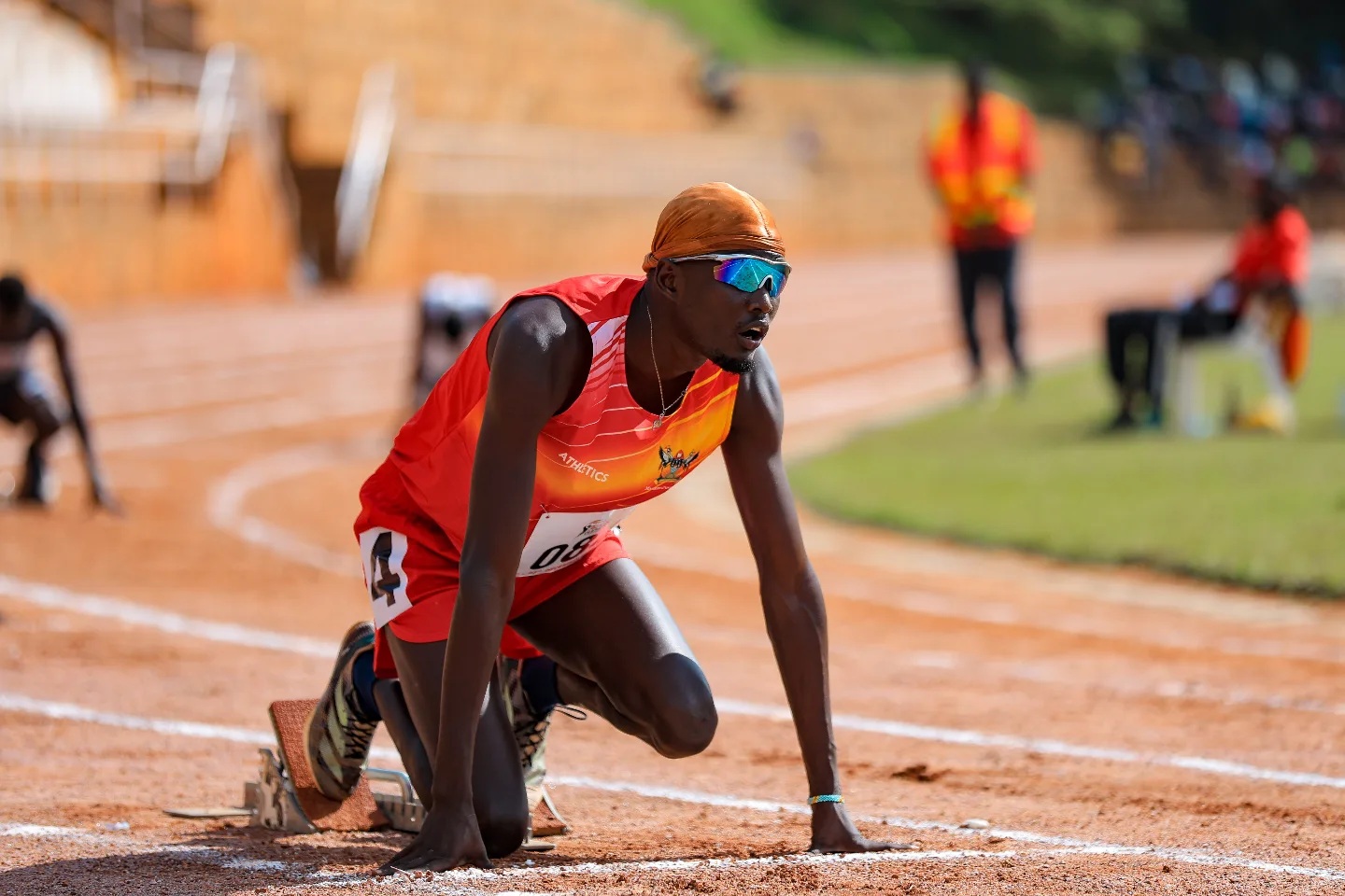 Makerere Athlete Omuka Kenneth on his marks before a race. Sports and Recreation Department, Makerere University, Kampala Uganda, East Africa.