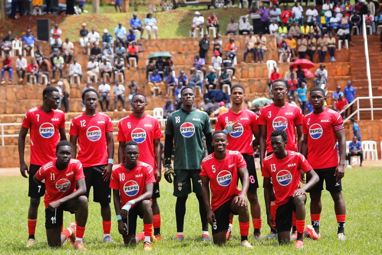 Mak Enzymes Football Team poses for a photo before a match. Sports and Recreation Department, Makerere University, Kampala Uganda, East Africa.