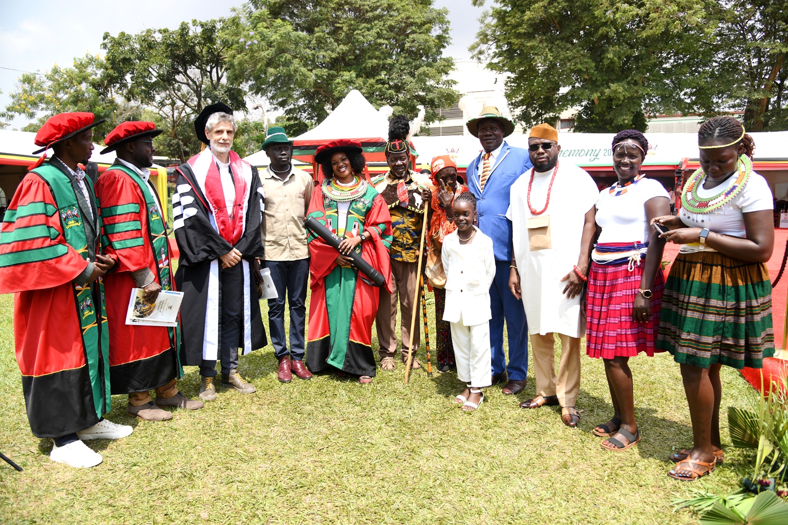 Dr. Olive Lomokol with Members of her family and MISR Faculty shortly after being conferred upon her PhD on Day 4 of the 76th Graduation Ceremony, 27th February 2026. 76th Graduation Ceremony, Day 4, College of Humanities and Social Sciences (CHUSS). Commencement Speaker-Ms. Reeta Roy, Former President & Chief Executive Officer, Mastercard Foundation. 27th February 2026, Freedom Square, Makerere University, Kampala Uganda, East Africa.