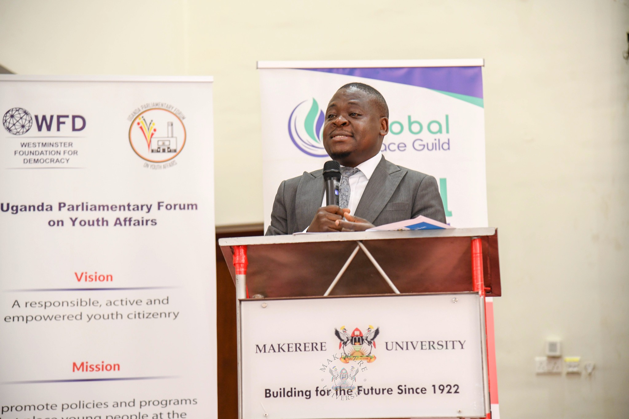 Dr. Andrew Musiime, 92nd Guild Security Ministry in partnership with the Global Peace Guild International Day of Peace 2026 and Launch of the East African Peace and Trade Law Moot Court Competition, presided over by Minister of State for East African Community Affairs, Hon. James Magode Ikuya represented by Dr. Andrew Musiime, 21st September 2026, Main Hall, Main Building, Makerere University, Kampala Uganda, East Africa.