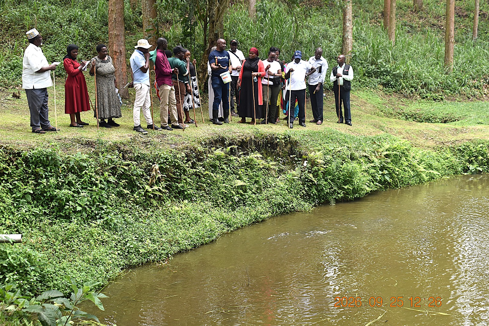 The farmers learning about fish farming at BIGLAD Agri-Tourism Farm Ltd. Farmers from Mbale City four-day learning exchange programme in Kasese Municipality and Kabarole District to gain new approaches to strengthening urban food production, 23rd-26th September 2026, supported by the Resilient Urban Food Systems (RUFS) Project, led by Prof. Frank Mugagga, Department of Geography, Geo-Informatics and Climatic Sciences, College of Agricultural and Environmental Sciences (CAES), Makerere University, Kampala Uganda, East Africa.