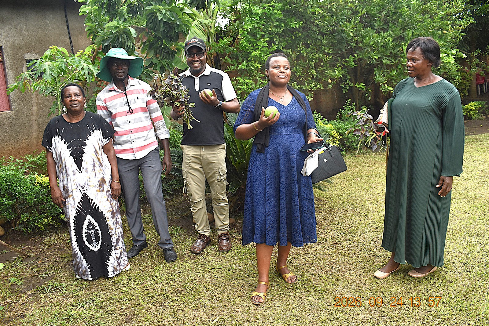 Some of the team members at Ms. Masika Grace's home. Ms. Masika is a smallholder farmer in Central Division, Kasese Municipality. Farmers from Mbale City four-day learning exchange programme in Kasese Municipality and Kabarole District to gain new approaches to strengthening urban food production, 23rd-26th September 2026, supported by the Resilient Urban Food Systems (RUFS) Project, led by Prof. Frank Mugagga, Department of Geography, Geo-Informatics and Climatic Sciences, College of Agricultural and Environmental Sciences (CAES), Makerere University, Kampala Uganda, East Africa.