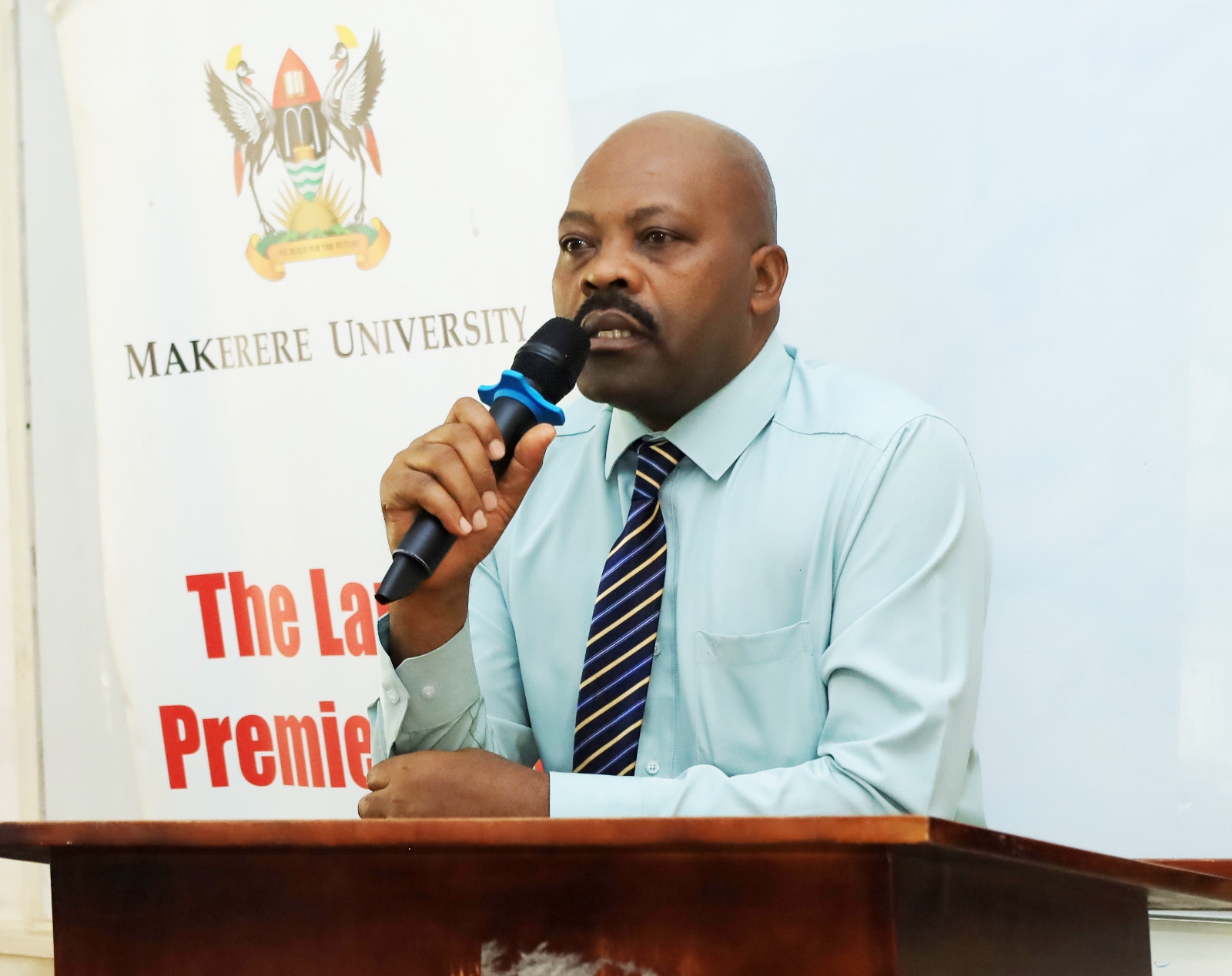 The College Registrar giving his remarks. College of Humanities and Social Sciences (CHUSS) orientation of 10 new Gerda Henkel Foundation PhD fellows, CHUSS Smart Room, 7th September 2026, Makerere University, Kampala Uganda, East Africa.