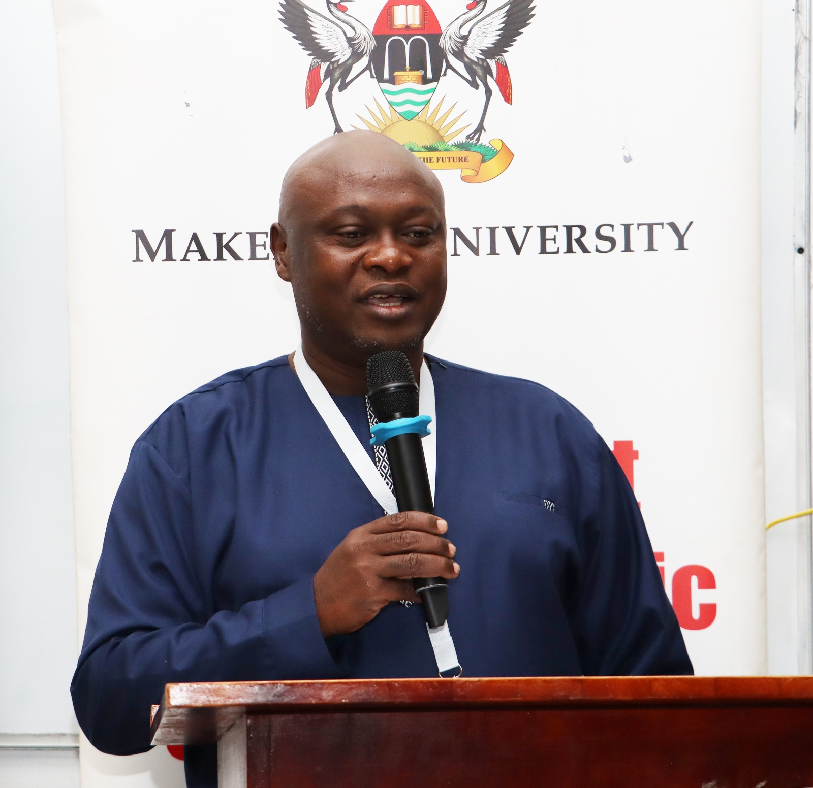 The Deputy Principal, who represented the Principal giving remarks during the workshop. Opening Ceremony of three-day workshop hosted by the Department of History, Archaeology and Heritage Studies, School of Liberal and Performing Arts, College of Humanities and Social Sciences (CHUSS) examining the historical relationship between climate change and migration in Uganda, under a joint project between Makerere University and the University of Cambridge, CHUSS Smart Room, 8th-10th September 2026, Kampala Uganda, East Africa.