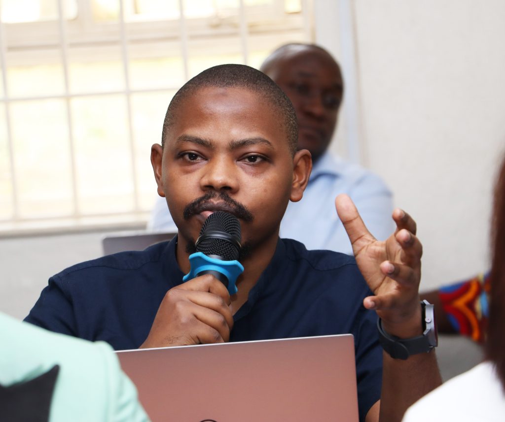 One of the participants asking questions after the keynote speech. Opening Ceremony of three-day workshop hosted by the Department of History, Archaeology and Heritage Studies, School of Liberal and Performing Arts, College of Humanities and Social Sciences (CHUSS) examining the historical relationship between climate change and migration in Uganda, under a joint project between Makerere University and the University of Cambridge, CHUSS Smart Room, 8th-10th September 2026, Kampala Uganda, East Africa.