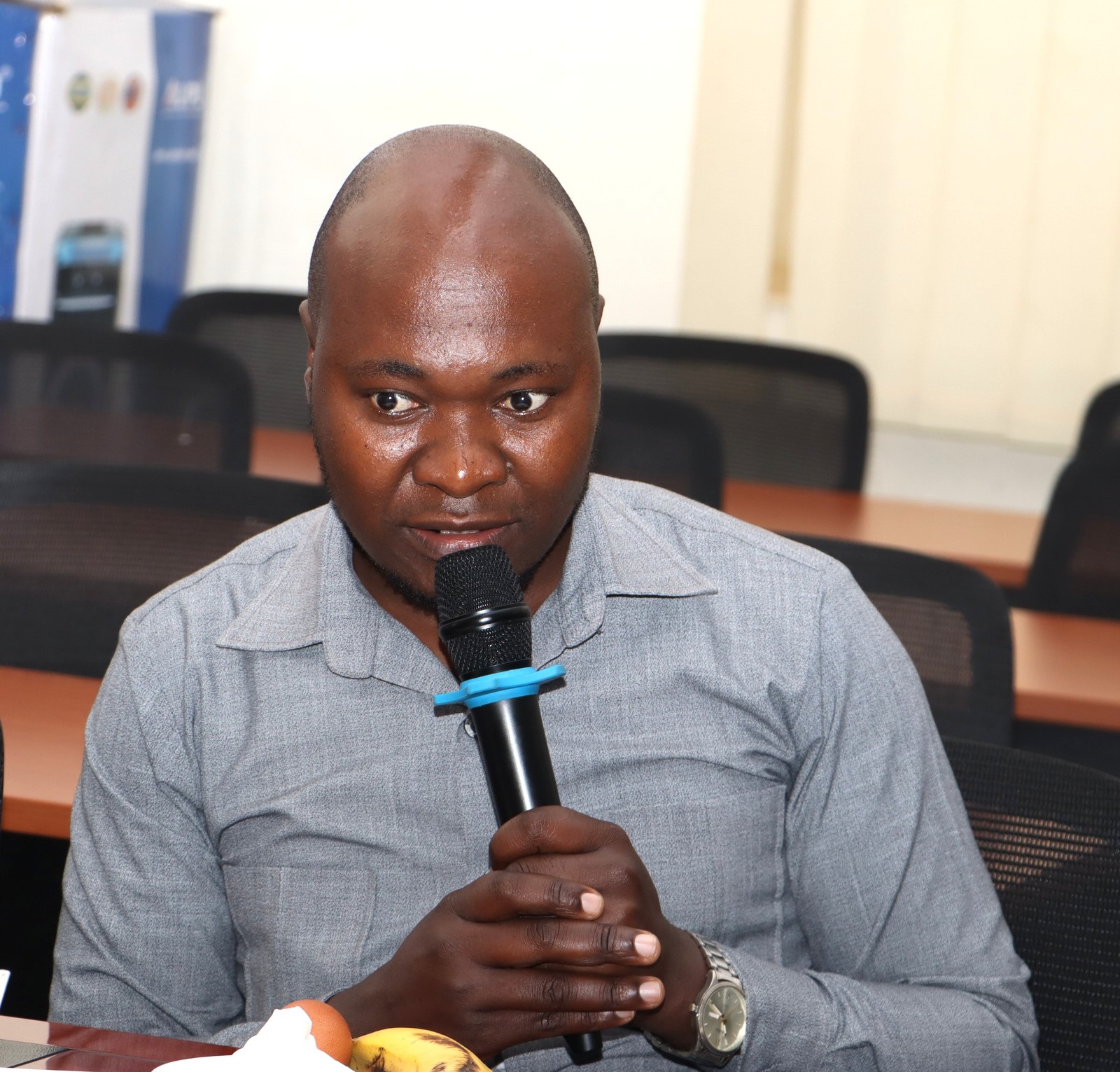 Internal Audit representative speaking. Official Handover of Office of Deputy Principal, College of Humanities and Social Sciences (CHUSS), from Associate Prof. Eric Awich Ochen to Prof. Eddy Joshua Walakira, 14th September 2026, CHUSS Smart Room, Makerere University, Kampala Uganda, East Africa.