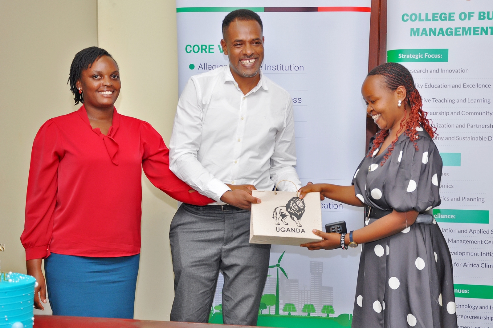 Heartwarming moment: Dr. Gemeda receives commemorative souvenirs from his mentees—Master’s and PhD students. College of Business and Management Sciences (CoBAMS) Environment for Development Initiative (EfD at Mak Centre) farewell to celebrate the outstanding contributions of Dr Gemeda Olani Akuma from the University of Cape Town, South Africa conclusion of his postdoctoral fellowship (July 2025 to September 2026), 2nd September 2026, Yusuf Lule Central Teaching Facility, Makerere University, Kampala Uganda, East Africa.