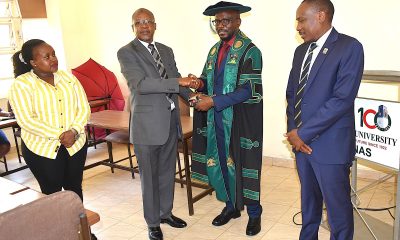 Prof. Juma Kasozi (2nd R) hands over the office keys and stamp to Prof. Godwin Kakuba. On the right is the Principal of CoNAS, Prof. Winston Tumps Ireeta, and on the left is Ms. Winnie Mbabazi from the Directorate of Internal Audit. Prof. Juma Kasozi formally hands over the office of Deputy Principal, College of Natural Sciences (CoNAS) to Prof. Godwin Kakuba, 11th September 2026, Makerere University, Kampala Uganda, East Africa.