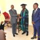Prof. Juma Kasozi (2nd R) hands over the office keys and stamp to Prof. Godwin Kakuba. On the right is the Principal of CoNAS, Prof. Winston Tumps Ireeta, and on the left is Ms. Winnie Mbabazi from the Directorate of Internal Audit. Prof. Juma Kasozi formally hands over the office of Deputy Principal, College of Natural Sciences (CoNAS) to Prof. Godwin Kakuba, 11th September 2026, Makerere University, Kampala Uganda, East Africa.