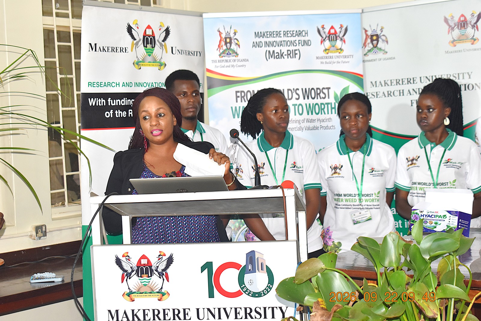 The Project PI, Dr Alice Nabatanzi briefing participants about the products developed, including biodegradable sanitary pads, a bio-fertilizer, and briquettes during the research dissemination workshop held at the PMB premises on 22nd September 2026. Research Dissemination for Government of Uganda through Makerere University Research and Innovations Fund (Mak-RIF)-funded project, titled “From World’s Worst Water Weed to Worth: Small-scale Community Bio-refining of Water Hyacinth to Produce Value-added Commercially Valuable Products,” by Dr. Alice Nabatanzi, Department of Plant Sciences, Microbiology and Biotechnology, College of Natural Sciences (CoNAS), Botany Lab 2, 22nd September 2026, Kampala Uganda, East Africa.