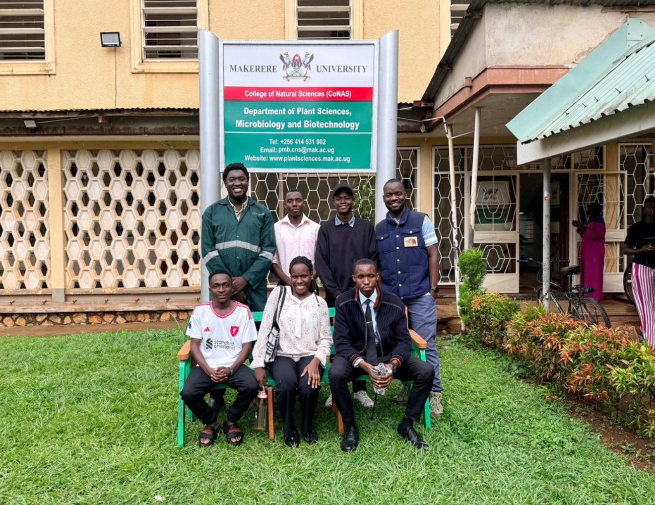 The alumni and some of the current students at the Department of Plant Sciences, Microbiology and Biotechnology. WastePlus Ltd, a waste management and recycling enterprise founded by BSc Conservation Biology from the Department of Plant Sciences, Microbiology and Biotechnology, School of Physical Sciences donation of furniture made from recycled plastic, August 2026, Science Quadrangle, College of Natural Sciences (CoNAS), Makerere University, Kampala Uganda, East Africa.
