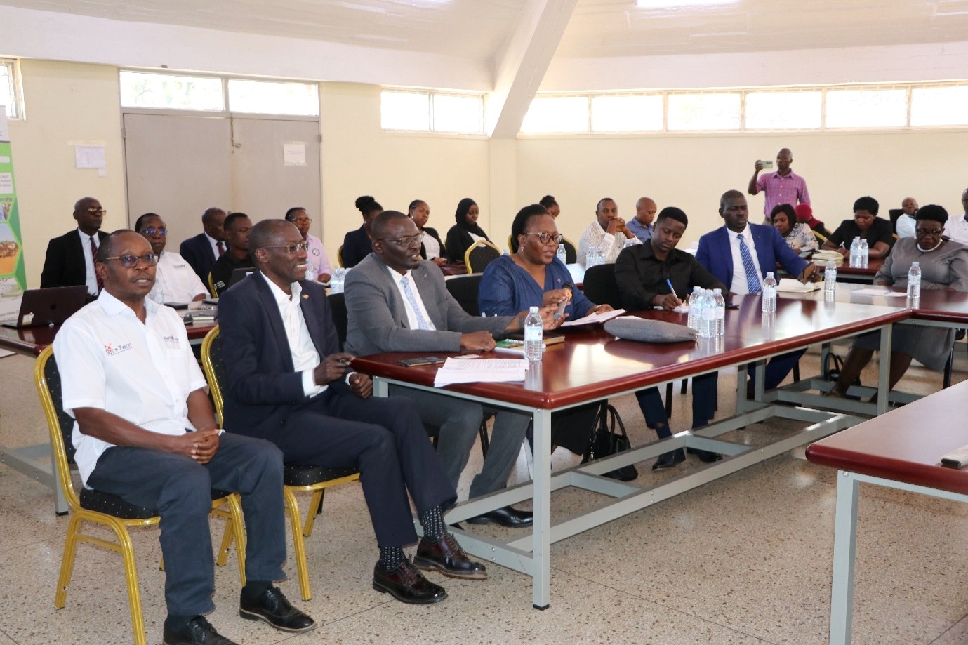 Hon. Dr. Samuel Opio Acuti (3rd L) with other officials during the meeting. Parliamentary Committee on Science, Technology, and Innovation visits the Centre for Global Biosecurity and Biomolecular Technology (CeBIOTECH) to assess the progress of ventures supported under the Science, Technology and Innovation–Office of the President (STI-OP) and answer How can Uganda turn investments in scientific research into practical technologies, enterprises, and solutions that respond to national development challenges? 31st August 2026, College of Veterinary Medicine, Animal Resources and Biosecurity (CoVAB), Makerere University, Kampala Uganda, East Africa.