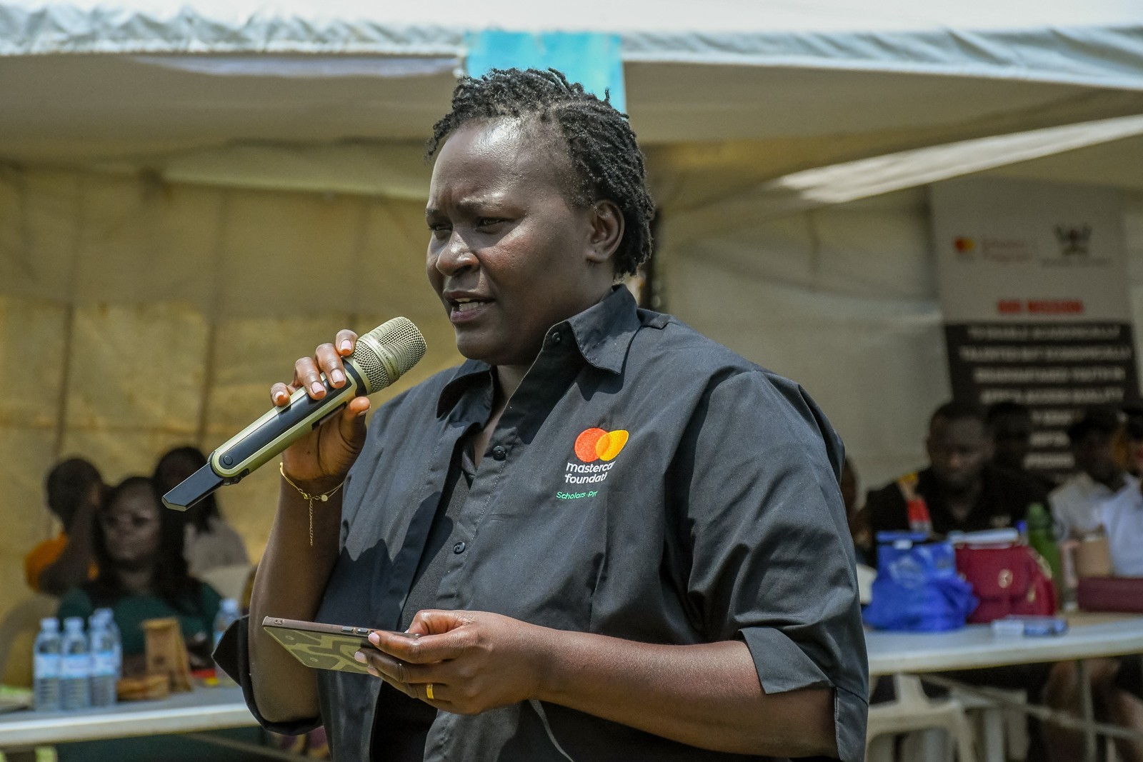 Prof. Claire Mugasa, who represented the DVC AA as the Chief Guest, delivering her remarks at the event. Community Open Day for Mastercard Foundation Initiatives at Makerere University, where Prof. Claire Mack Mugasa represented the Deputy Vice Chancellor (Academic Affairs) Prof. Sarah Ssali as Guest of Honour, 5th September 2026, Freedom Square, Kampala Uganda, East Africa.