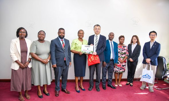 Prof. Sarah Ssali presents the Makerere coffee table book to Dr. Okano Takasei as Makerere and JICA Officials witness on 4th September 2026. Japan International Cooperation Agency (JICA) delegation led by Dr. Okano Takasei meets DVCAA Prof. Sarah Ssali, explores new opportunities for strengthening academic, research and innovation collaboration between Uganda, Japan and other African countries, with a particular focus on artificial intelligence (AI), aerospace engineering, materials and remote sensing, food value chains, energy, water and climate change, 4th September 2026, Main Building, Makerere University, Kampala Uganda, East Africa.