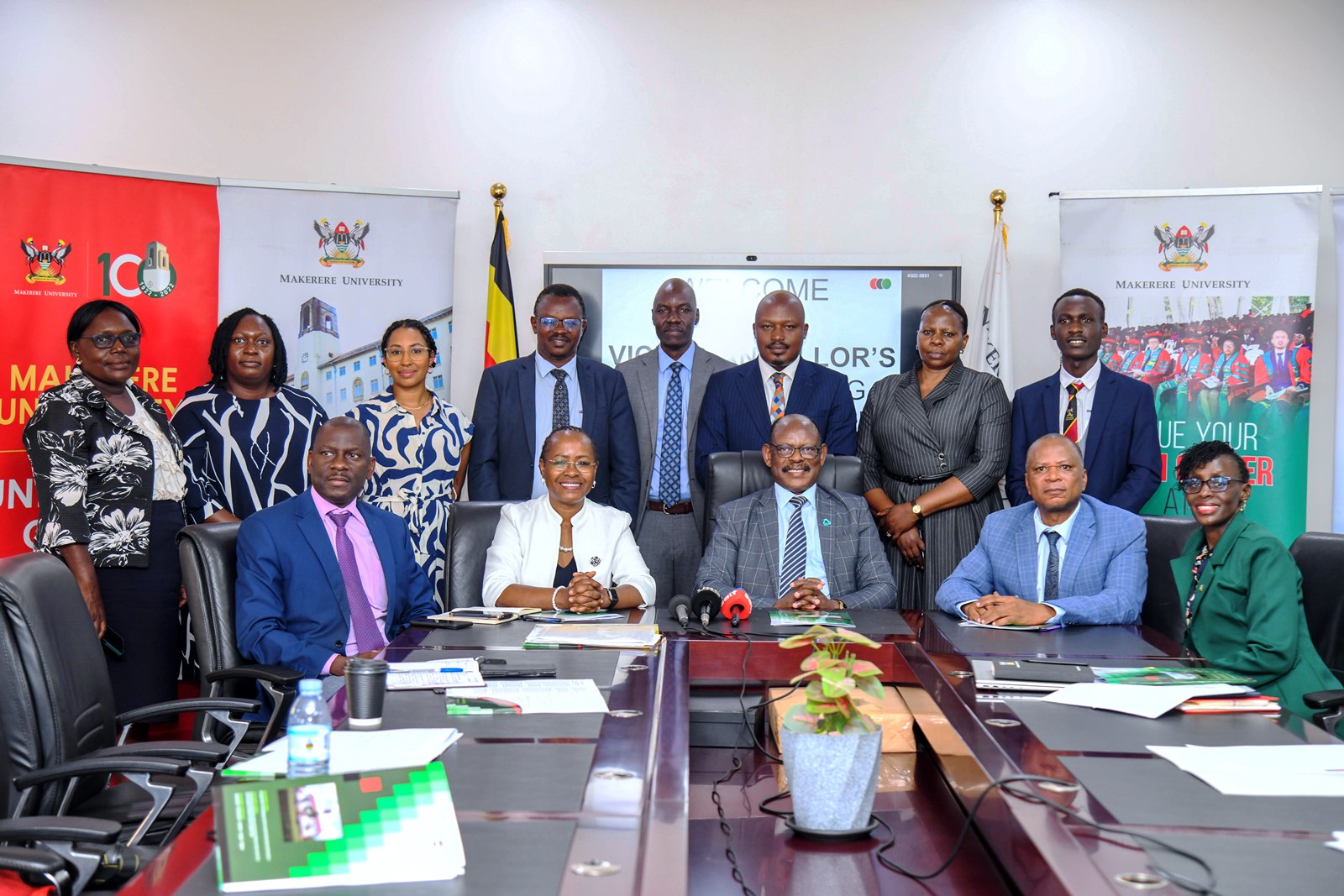 Seated: Prof. Barnabas Nawangwe (C) flanked by Prof. Sarah Ssali (2nd L) and Prof. Moses Musinguzi (2nd R), Members of Management and other officials (Seated and Standing) at the Press Conference on 15th September 2026. Vice Chancellor's Press Conference, VC's Boardroom, Main Building, Kampala Uganda, East Africa.